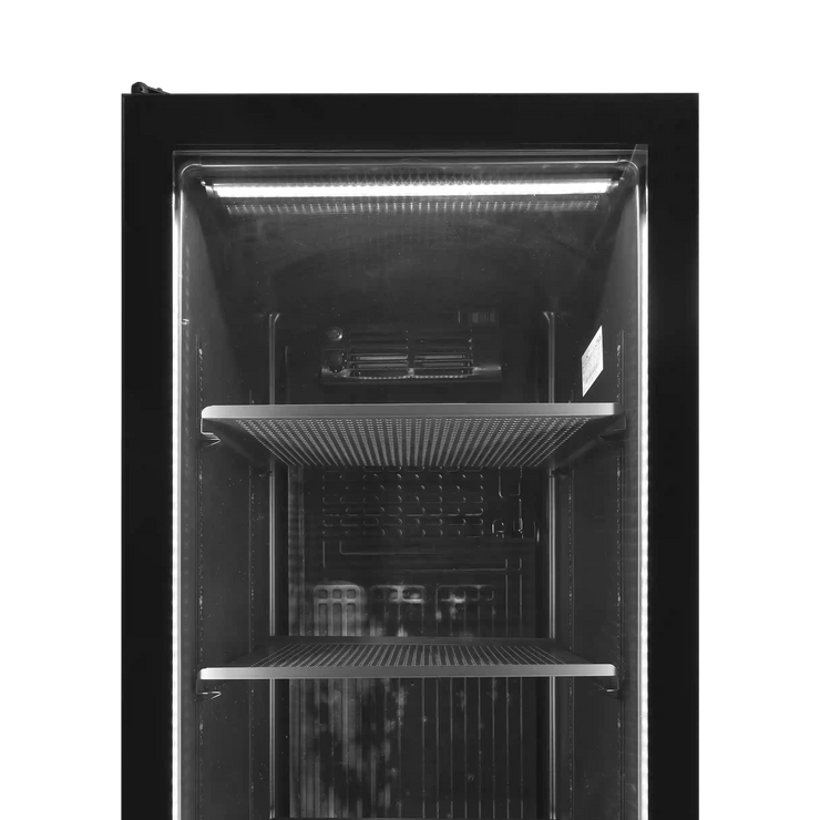 Toppvy inuti TEFCOLD SCU1425 FRAMELESS Dryckeskyl med belysning och gallerhyllor.