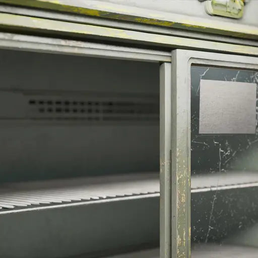 Närbild av gammal displaykyl med sprucket glas.