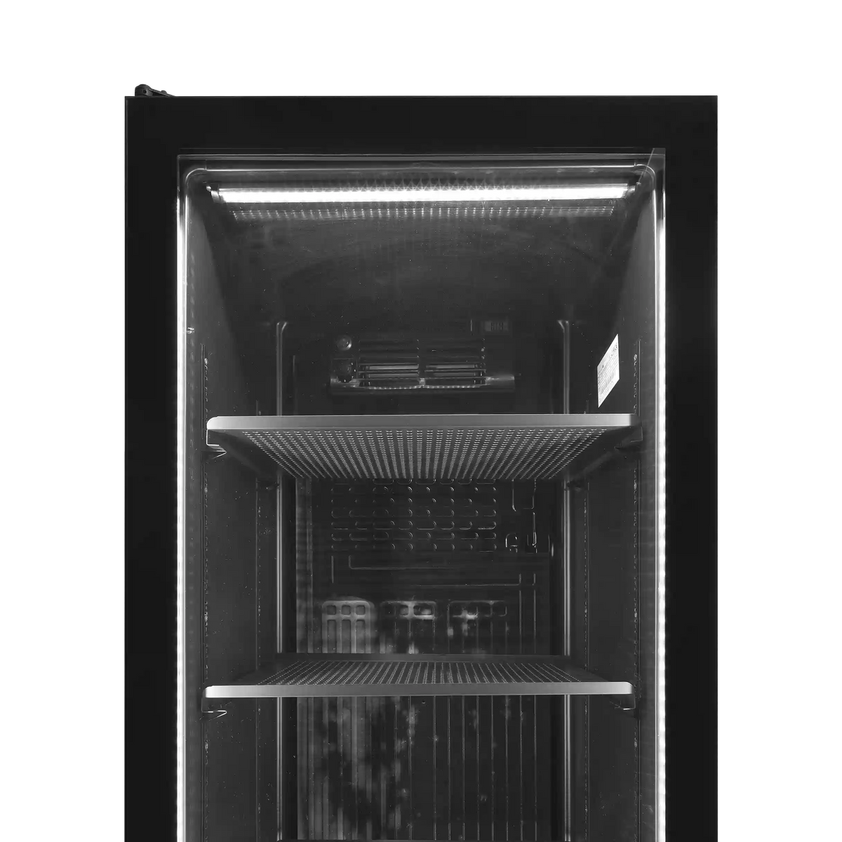 Toppvy inuti TEFCOLD SCU1425 FRAMELESS Dryckeskyl med belysning och gallerhyllor.