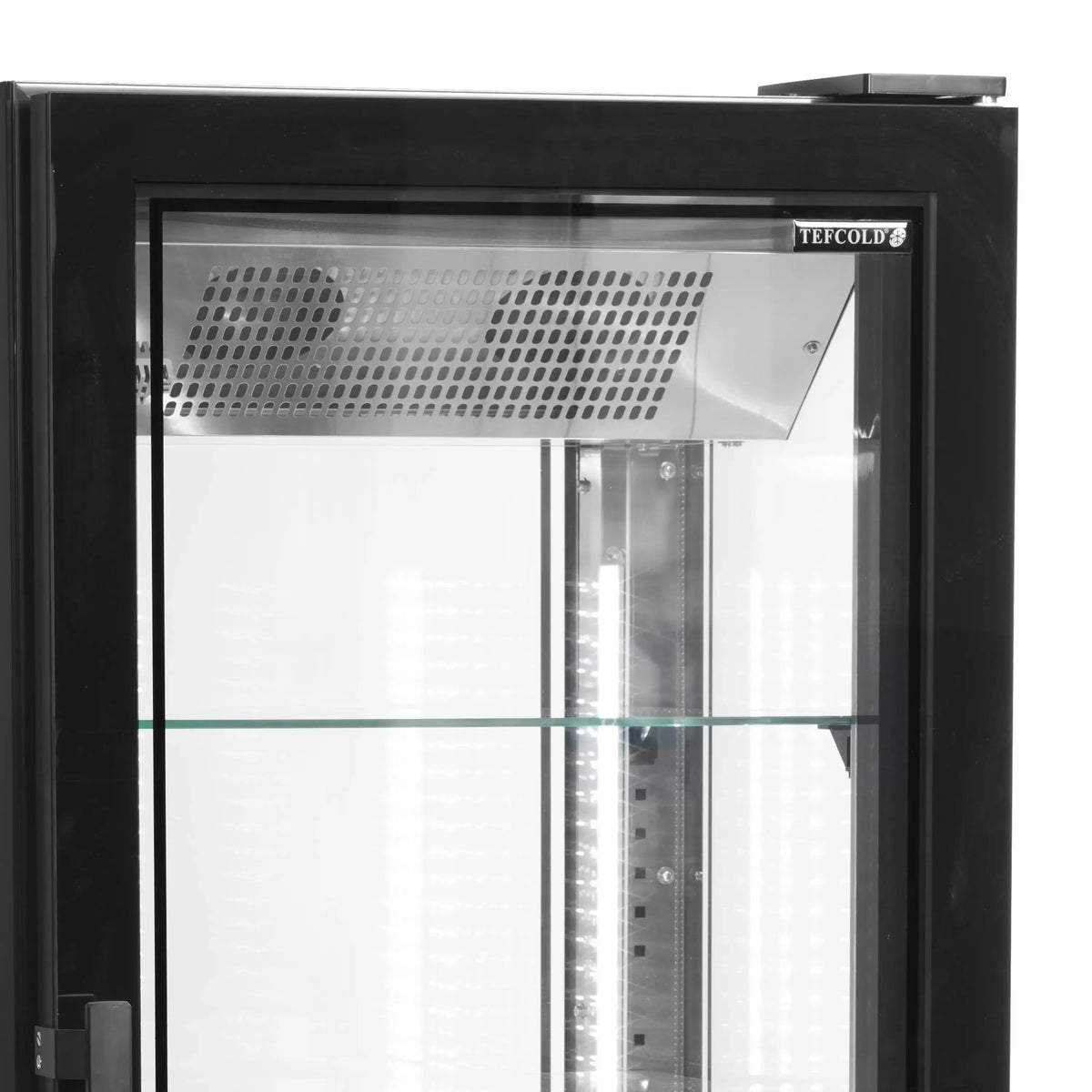 Övre del av TEFCOLD UPD400-F Frysmonter med ventilationsgaller och LED-belysning.