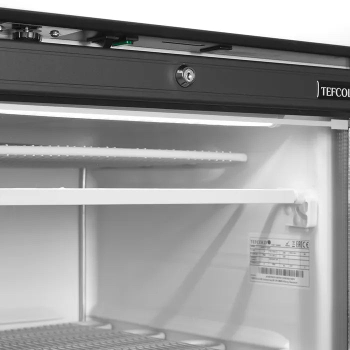 Närbild ovanifrån på låsmekanismen på TEFCOLD UFSC371GCP